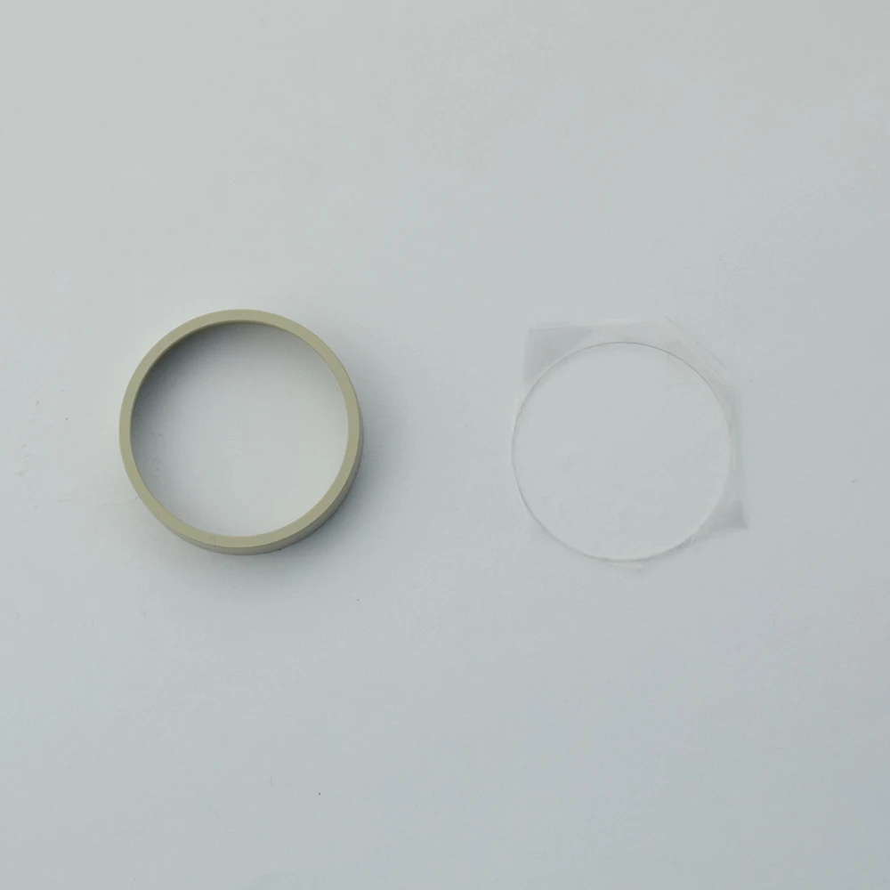 Pièce détachée drone : bague et verre UV pour gimbal DJI Phantom 4, emballage d'origine visible.