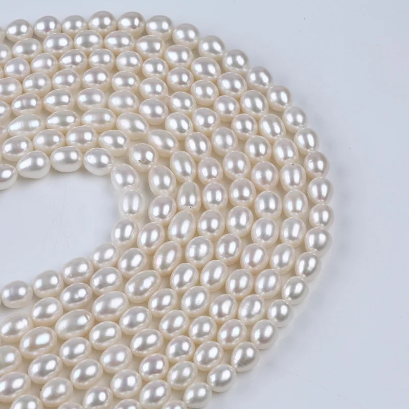 

Wholesale jewelry making beaded strands 9.3-10.3mm natural white freshwater pearl rice beads
