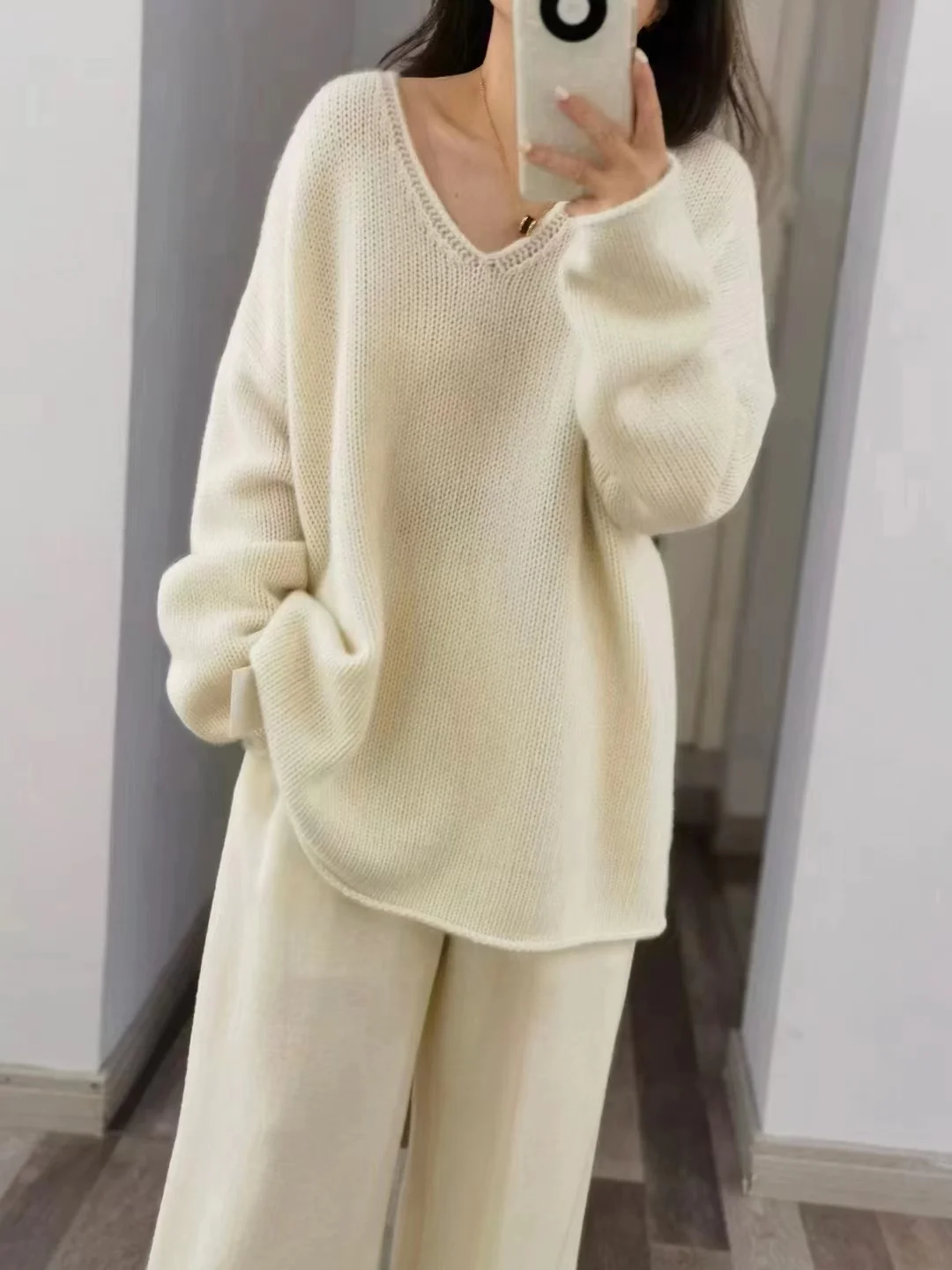 

Autumn and winter women's casual solid color V-neck long sleeved loose sweater
