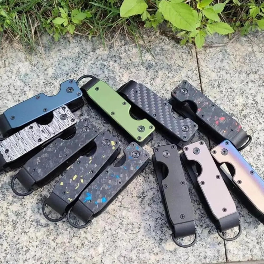 탄소 섬유 금속 키 주최자 혁신적인 분실 방지 금속 열쇠 고리에는 스크루 드라이버 키 관리자 여성과 함께 2-6 개의 키를 보관합니다.