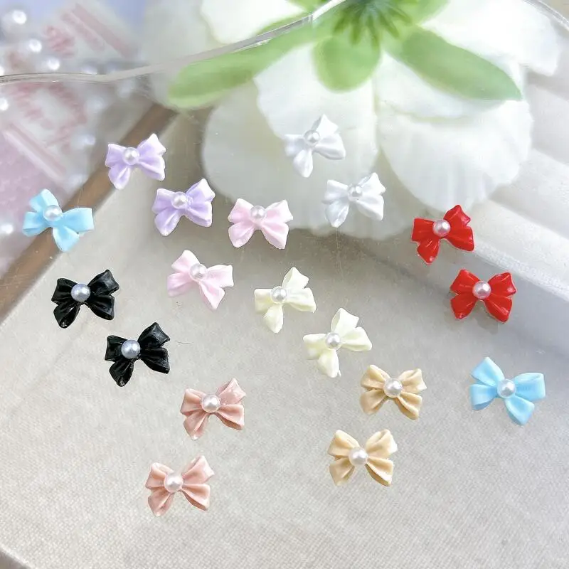 20PCS 솔리드 컬러 진주 Bowknots 네일 매력 3D 미니멀리스트 광택 넥타이 수지 네일 아트 장식 DIY 머리핀 손톱 장식품