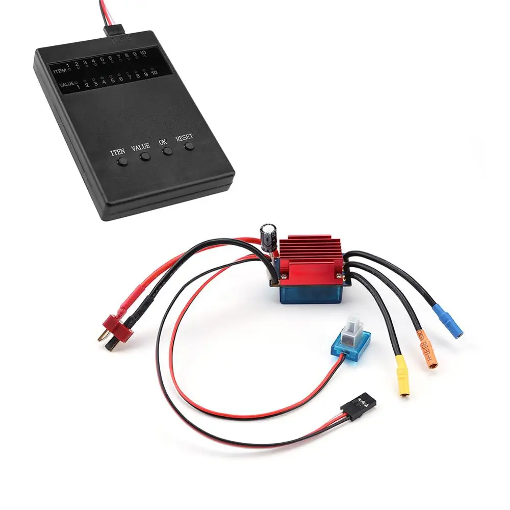 Carte programmateur pour ESC RC avec écran LCD et boutons, posée à côté du contrôleur