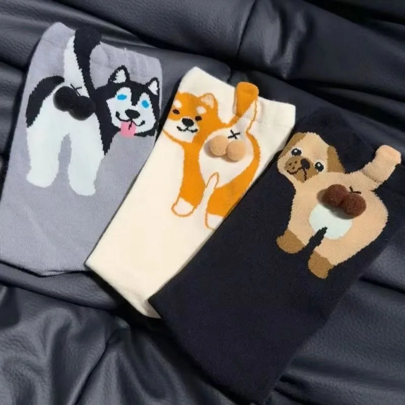 Stacked cartoon cat socks showcasing embroidered designs