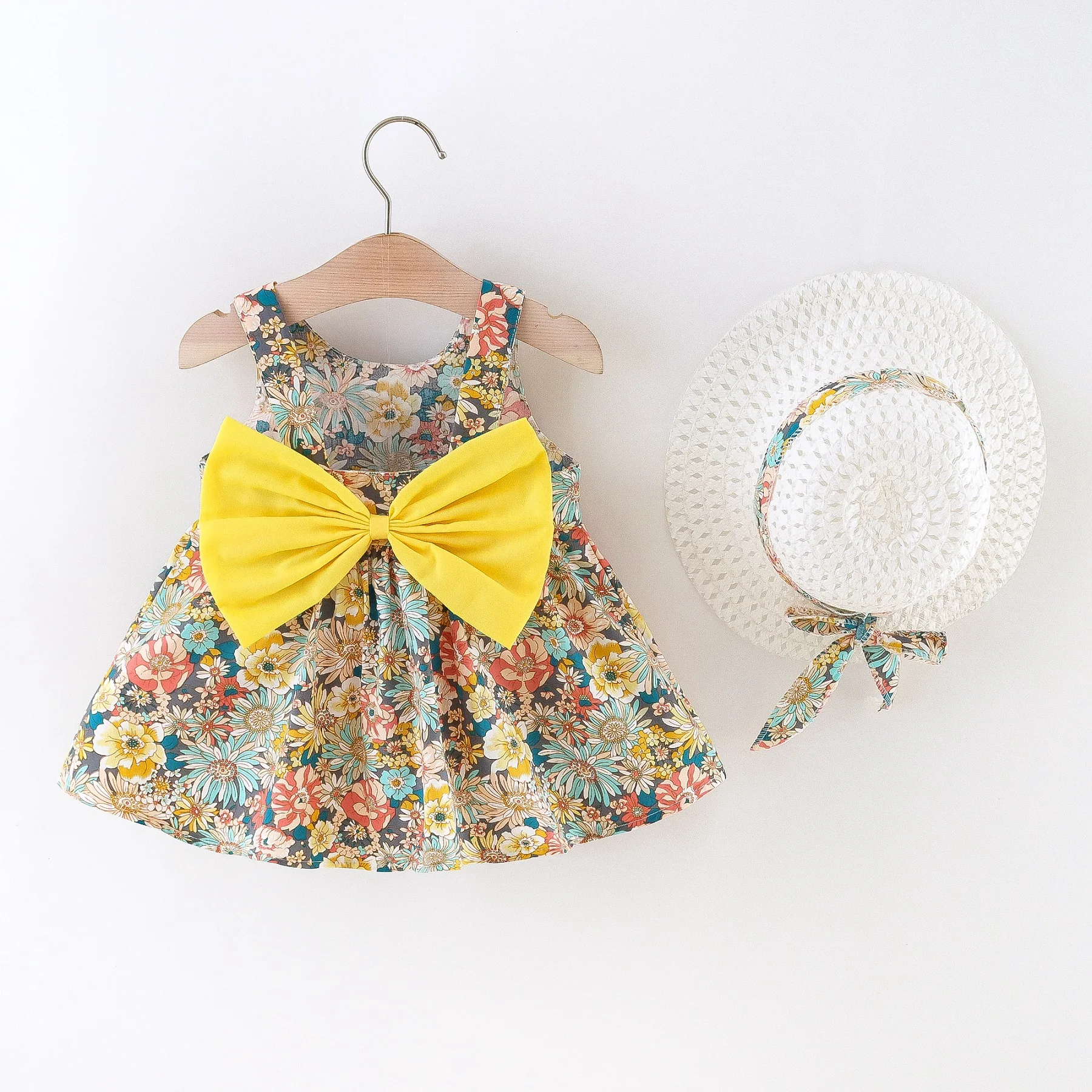Description Picture 3 of item2/piece set of girl dresses and hats summer girl big bow various flower prints suspender princess dresses