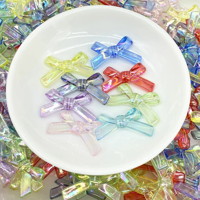 10 transparent bow beads