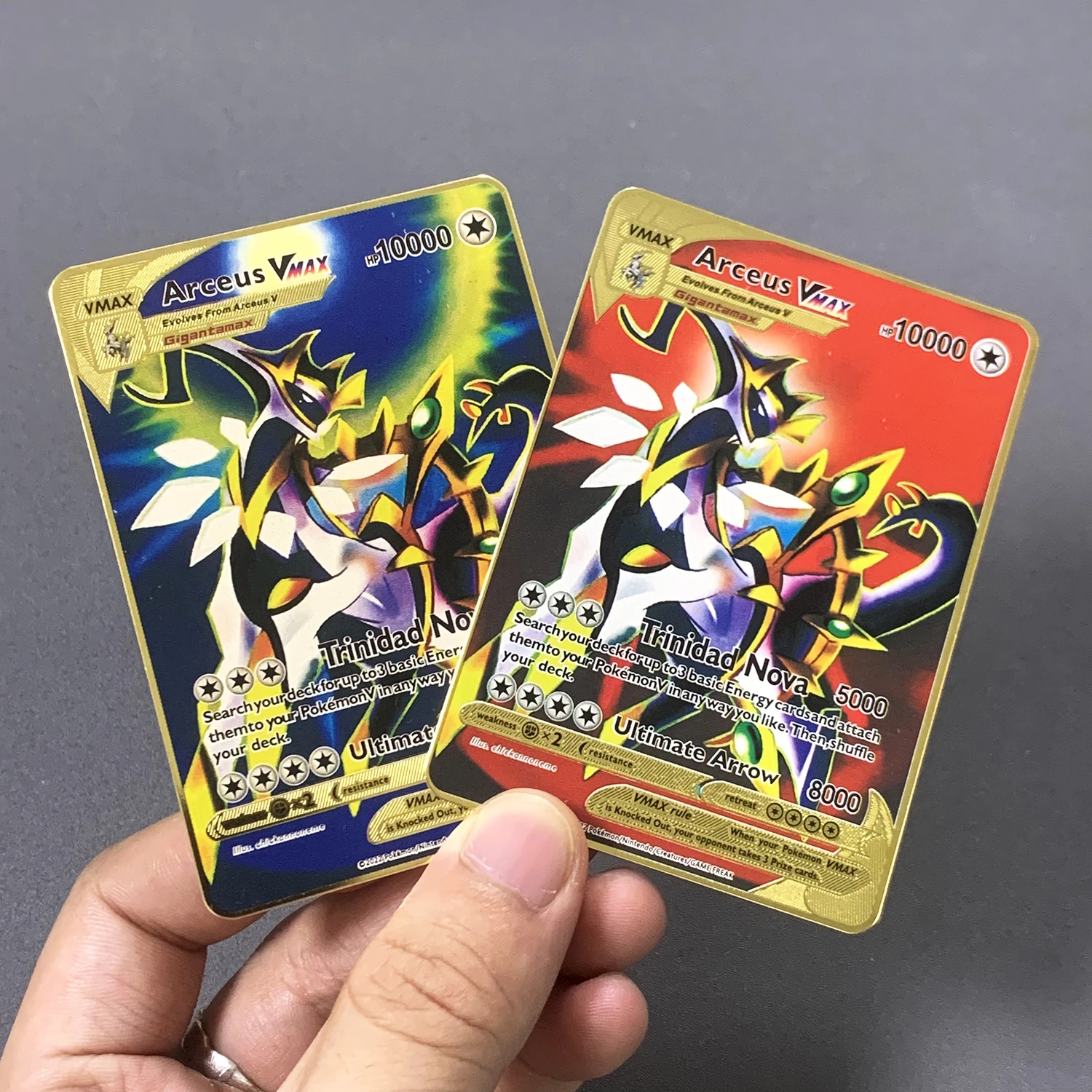 thumbnail image 1 of Treingi 2024 10000PH Pokemon Gold Metal Card Arceus Pikachu Charizard VMAX Versión en español Colección de juegos Pokémon Tarjetas de metal de hierro Regalos para niños, 1 of 5