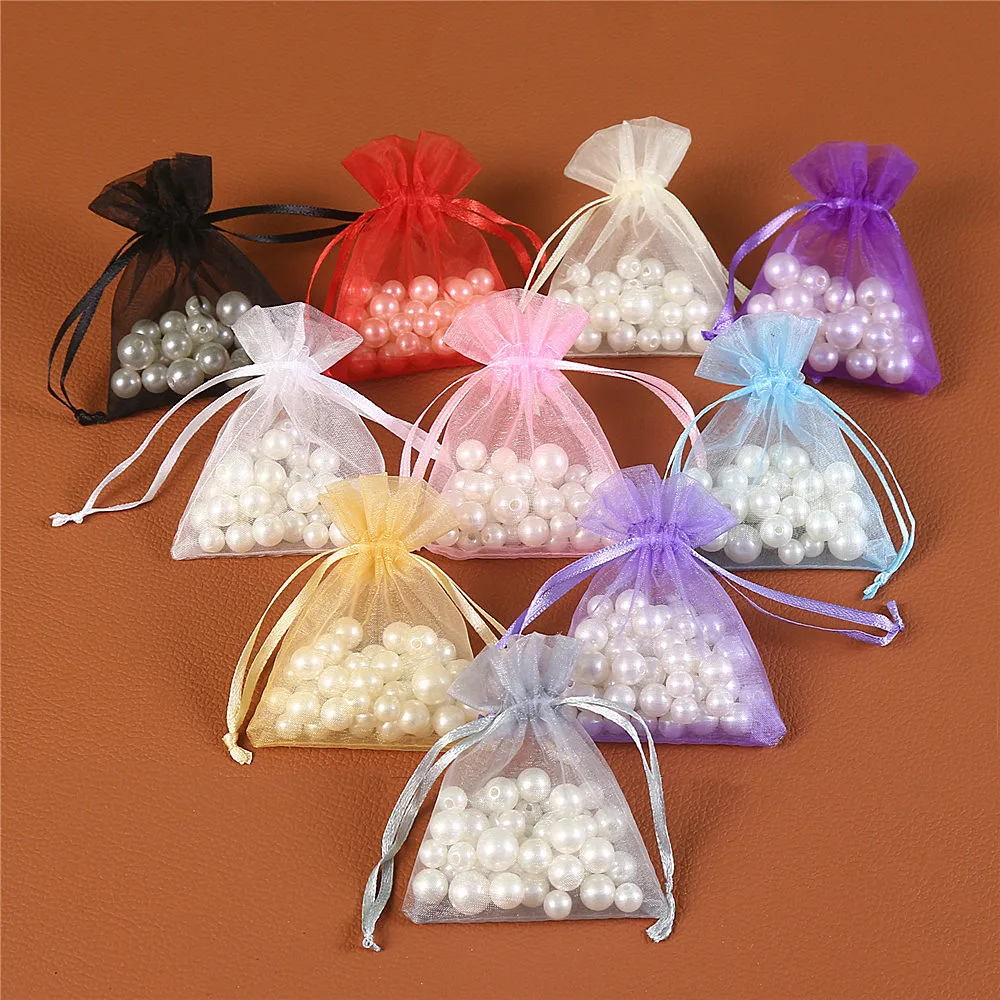 

100PCS Ювелирные мешки 7 * 9 8 * 10 10 * 12 cm Стеклянные мешки Свадебная вечеринка Рождественские подарки конфеты Сбор веревочных мешков