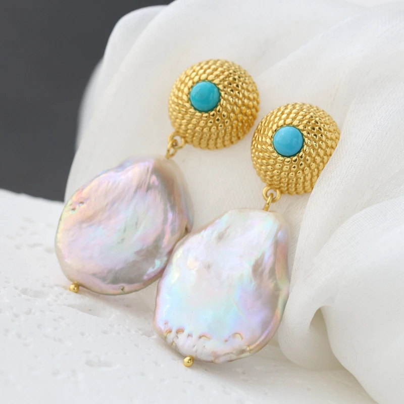 

Серьги из серебра 925 пробы с натуральным пресноводным жемчугом 18 карат