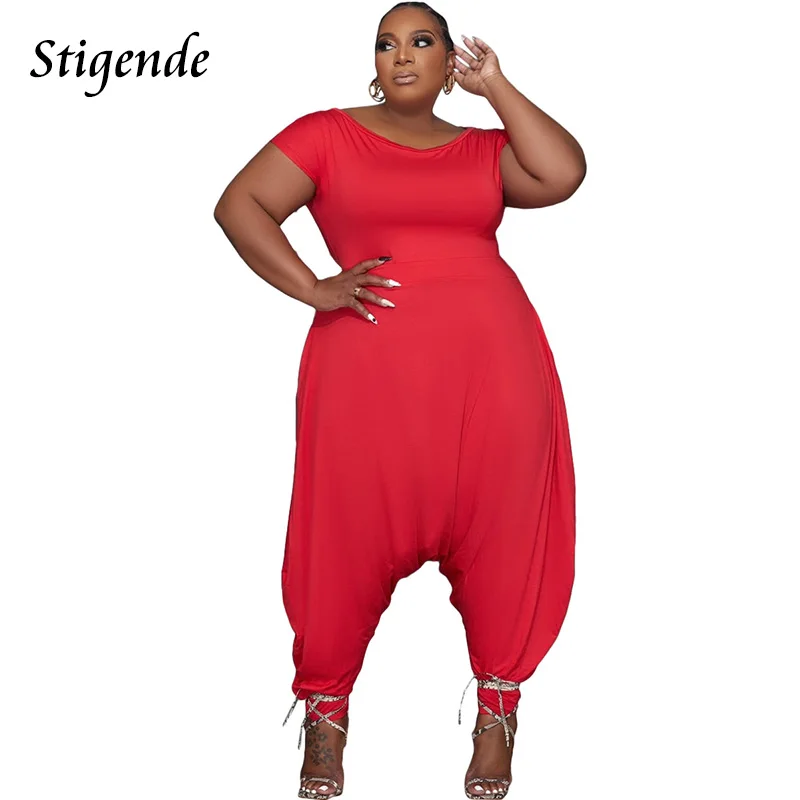 

Women Loose Fit 4XL Jumpsuit Streetwear Solid Color Bodycon Harem Pant Fashion Short Sleeve O Neck Jumpsuit Overalls