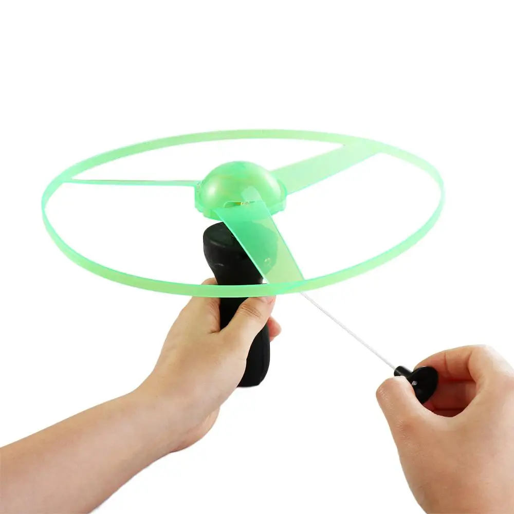

Aircraft Flying Gyroscopes Rope Flying Luminous LED Flying UFO Propeller Helicopter Toys Spinning Top Pull String Flying UFO