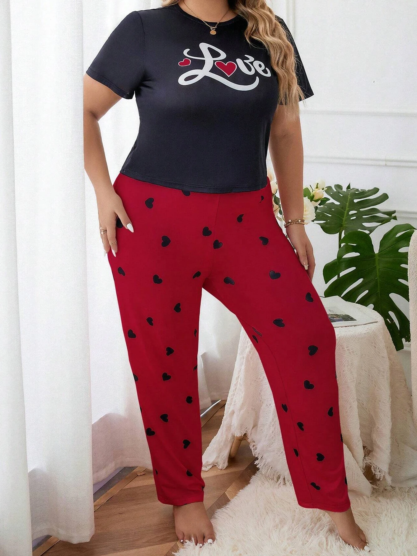 Plus size pajama set with minimalist style  suitable for both home and casual wear. Short sleeved and long pants set plus size