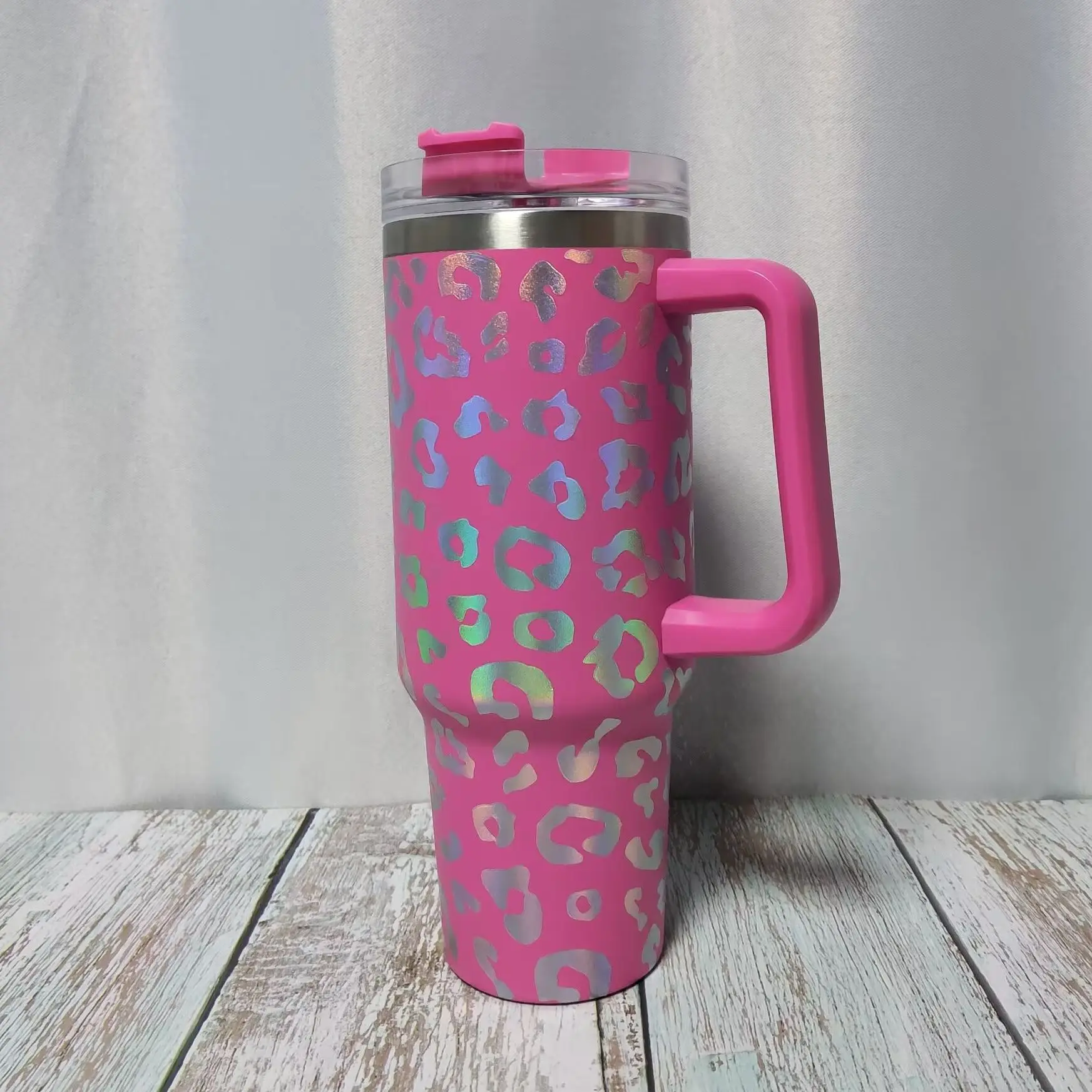 https://ae01.alicdn.com/kf/Sb33ef2156e1447a69f181115ab96b3b7K/40oz-Holographic-Tumbler-With-Handle-Cheetah-Insulated-Stainless-Steel-Water-Tumbler-With-Straw-Engraved-Stan-ley.jpg