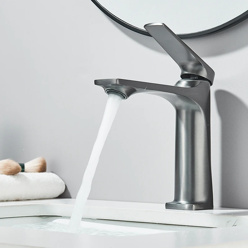 Gun grey faucet spout detail in close range