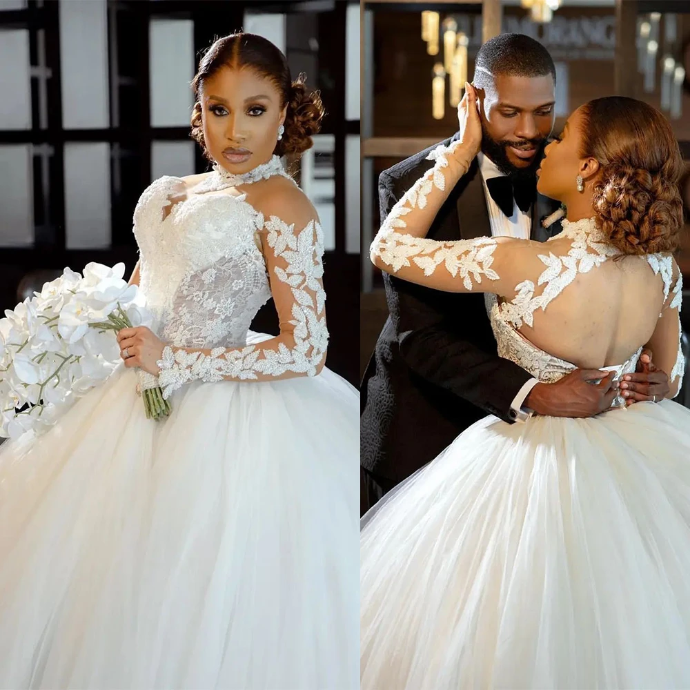 

Gorgeous Ball Gown Wedding Dress For Women Appliques Bridal Gown High Collar Long Sleeves Skirt Sweep Train Backless Dresses