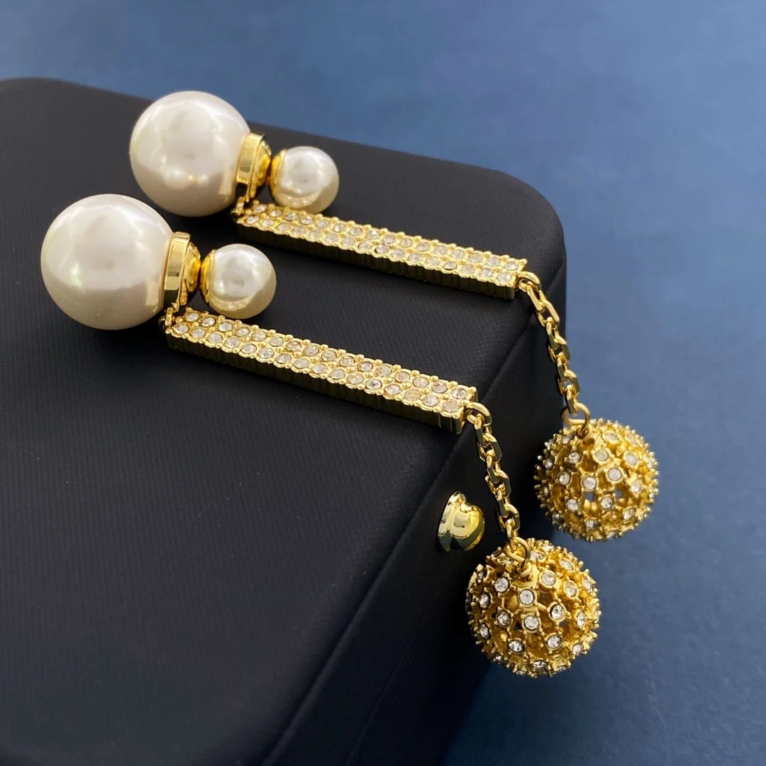 

Smooth round hollow double ball resin bubble size pearl earrings