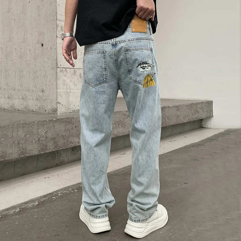Fashionable high street new pumpkin printed men's jeans fashion brand design straight and versatile loose pants