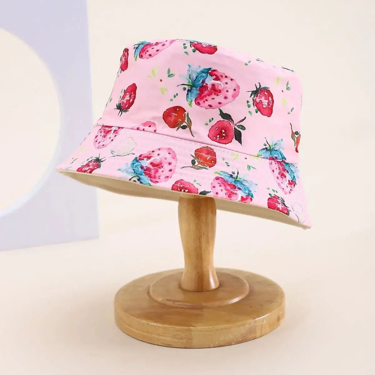 A children's strawberry printed bucket hat with double-sided sun visor cute spring summer versatile basin hat for boys girls