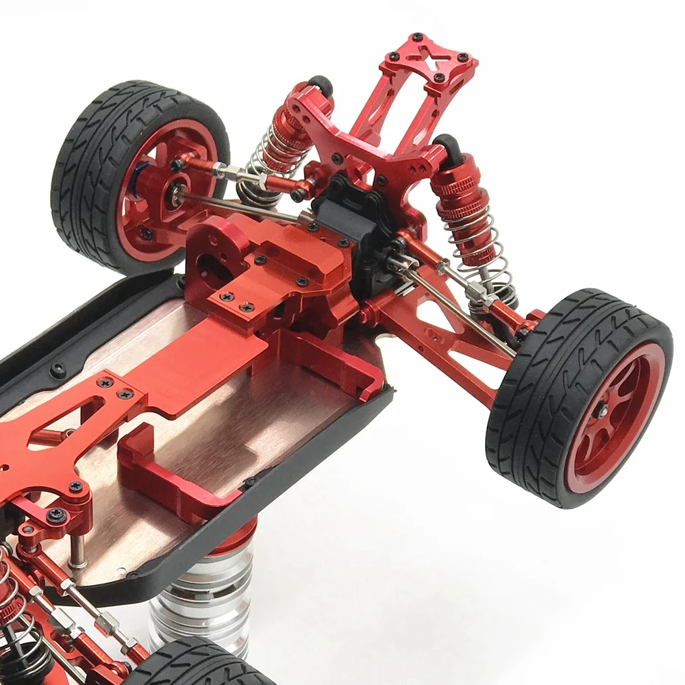 Vue rapprochée du support moteur RC en métal rouge et ses fixations