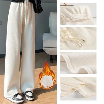 Pantaloni lunghi da donna a vita alta 1