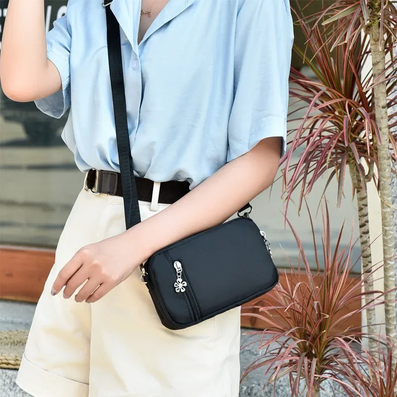 

Mobile Phone Bags Female Hand Holding Mini Small Bag New All-match Messenger Bag Wrist Mobile Phone Bag Long Coin Purse