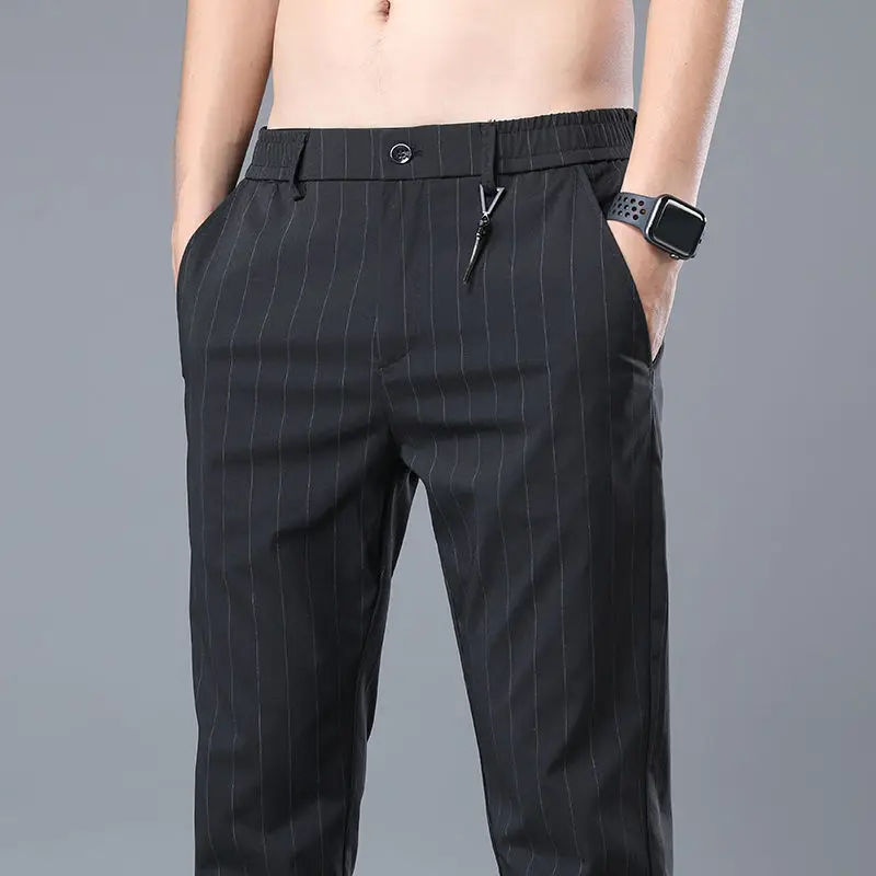 Korejské knihtisk pruhované přímo oblek kalhot muži knoflík na zip kapsa léto nový jednoduchý versatile móda volné ležérní kalhoty