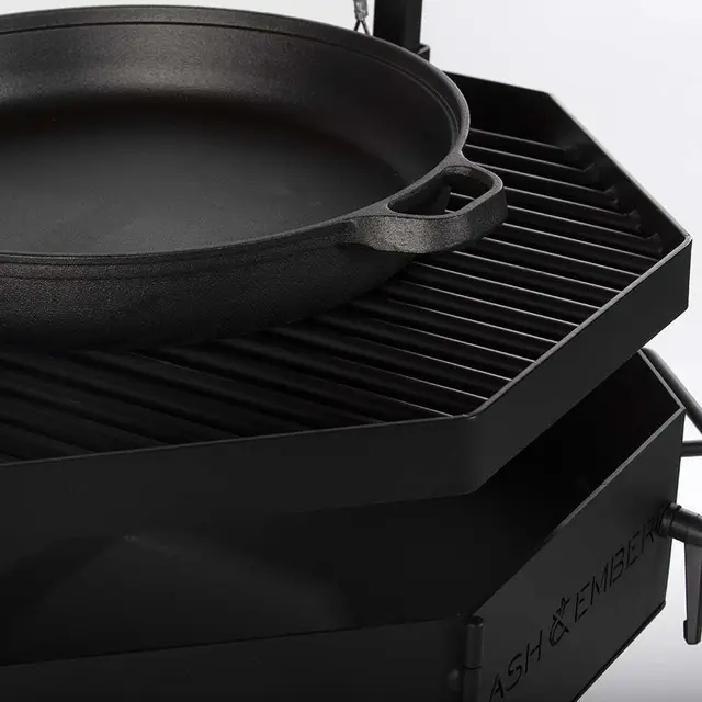 Argentine-Inspired Santa Maria Fire Grill by Titan Great Outdoors, featuring Adjustable Grate, Cast Iron Skillet, and Flywheel C 4