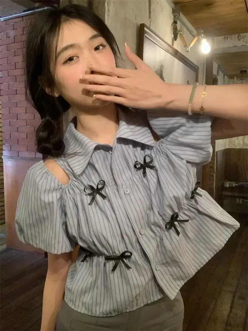 

Summer 2024 Blue Striped Bow Patchwork Women Shirt French Chic Puff Sleeve Blouse Turn-down Collar Shoulder Hollow Out Top