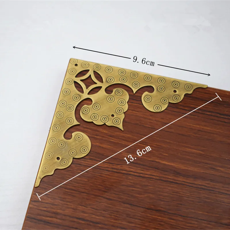 https://ae01.alicdn.com/kf/Sb3f2b6aceeba4d00a64f3f4188c2c97dc/Antique-Corner-Protector-Decorative-Decorative-Corners-for-Furniture-Chinese-Pure-Copper-Cabinet-Brackets-Metal-Crafts-Hardware.jpg