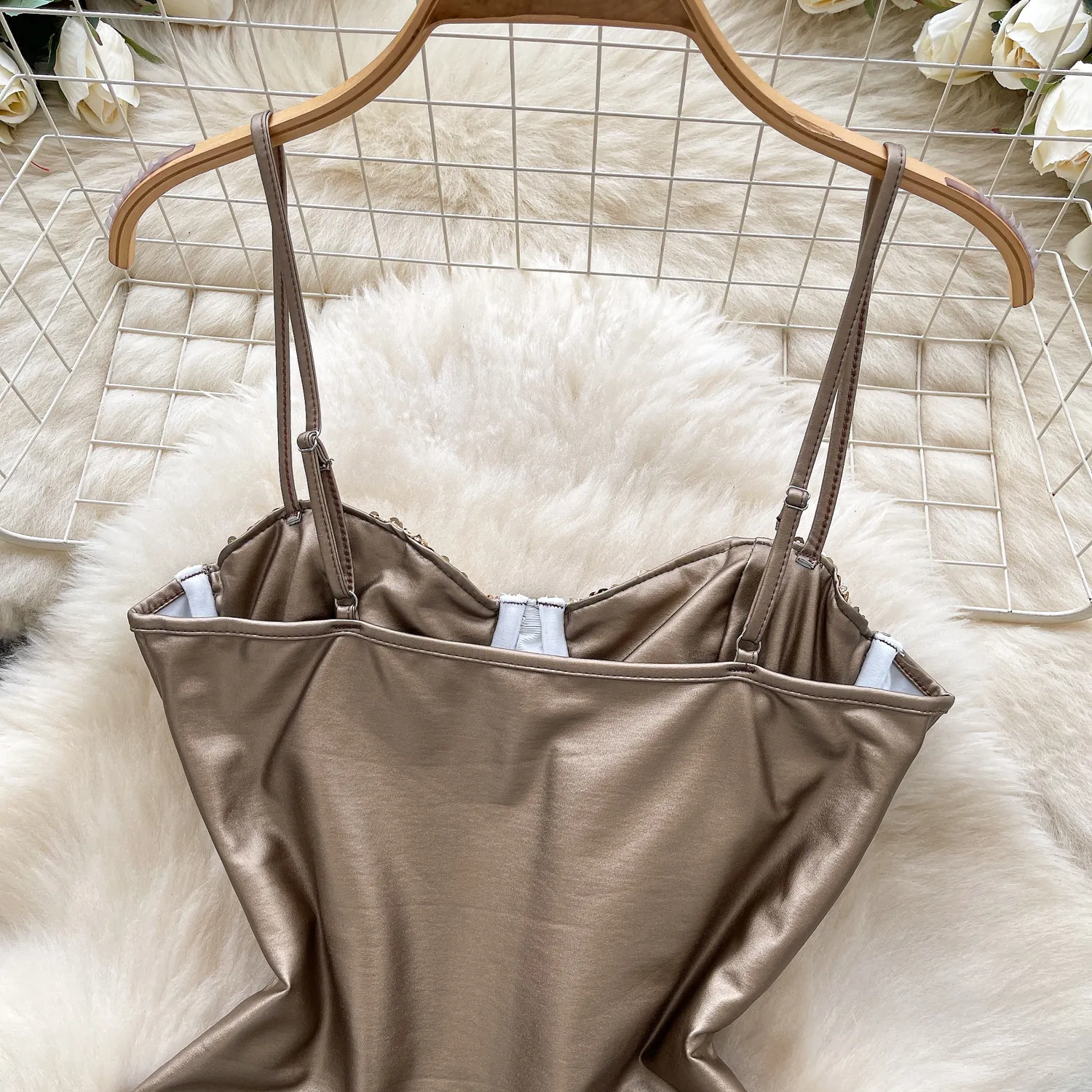 elegant strap detail on sequin bodysuit
