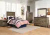 Trinell Rustic 5 Drawer Chest of Drawers with Nailhead Trim, Warm Brown 6