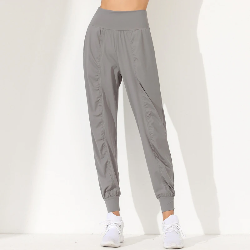 Yoga Pants Woman Loose Slim Quick-Dry Pleated Hem Bound Running Fitness Capris Pockets
