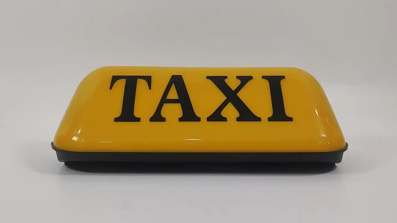 Het Blauwe Teken Van De Taxi Stock Afbeelding - Image of vervoer, stad