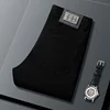 Pure Black Jeans Men's Fashion Simple Business High-End Straight Trend Men's Light Luxury Casual Slim Fit Stretch Feet Pants 1