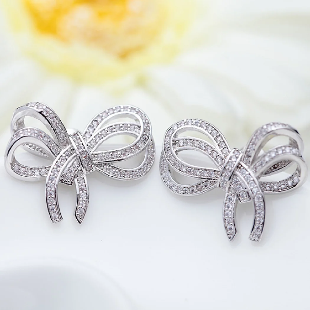 

Trendy jewelry classic full pave zircon bow shape women's wedding earring jewelry metal cooper stud earring percing accessory