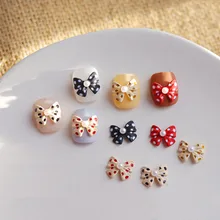 

Nail Art Bowknot Shaped Charms Decorations,Wave Point Designs Butterfly Nail Rhinestones Jewely,Resin 10*12mm Nail Charms 10pcs/