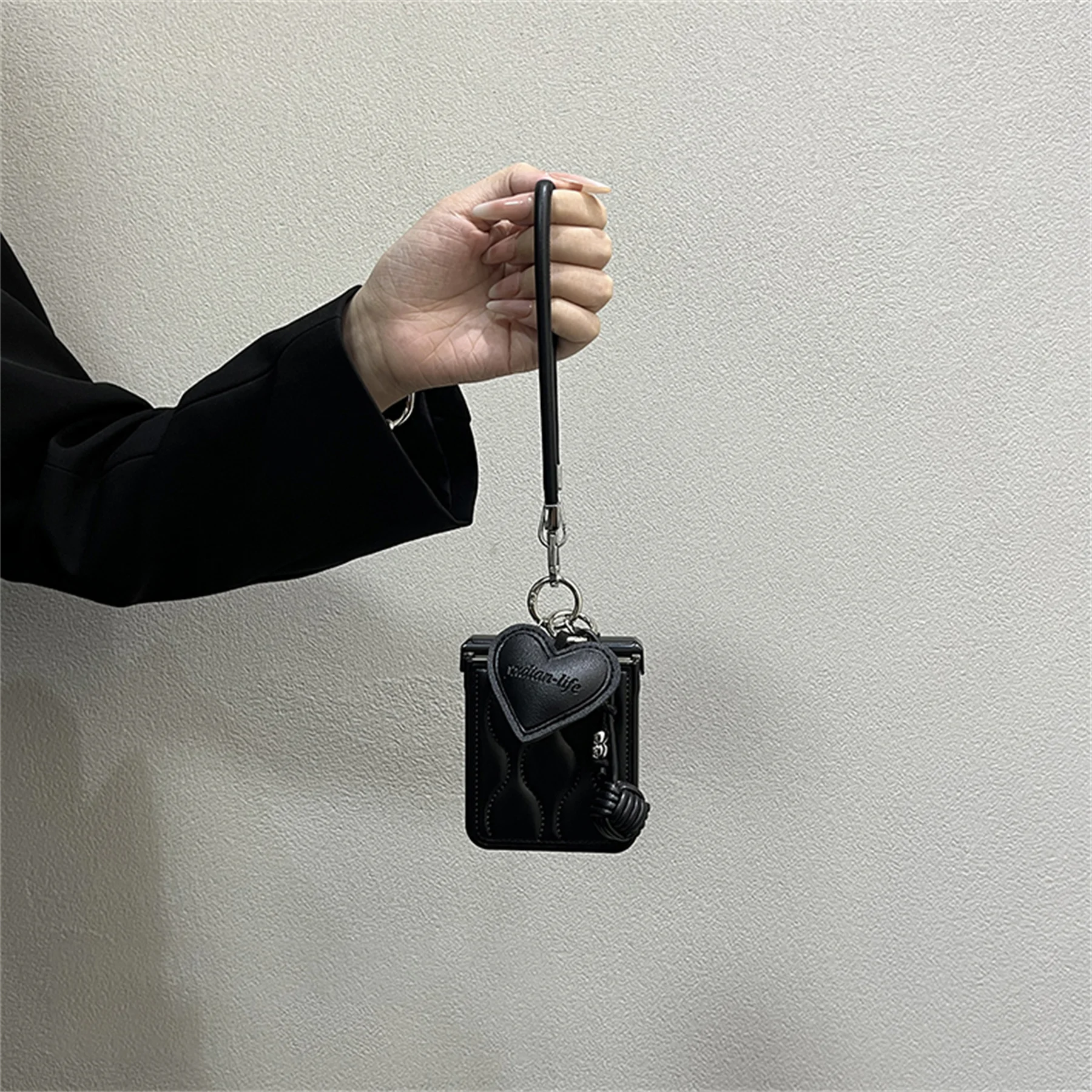 Luxury Wave Black Phone Case with Love Pendant Leather Strap