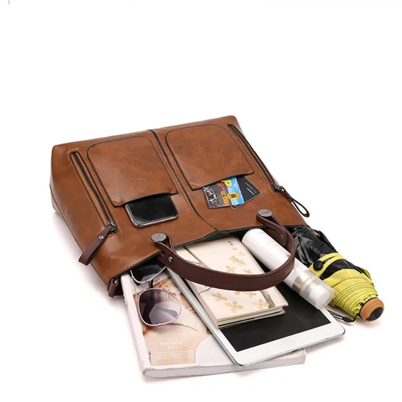 Retro leather handbag with two zipper pockets, versatile tote and crossbody style, classic women’s work and business bag. 1245