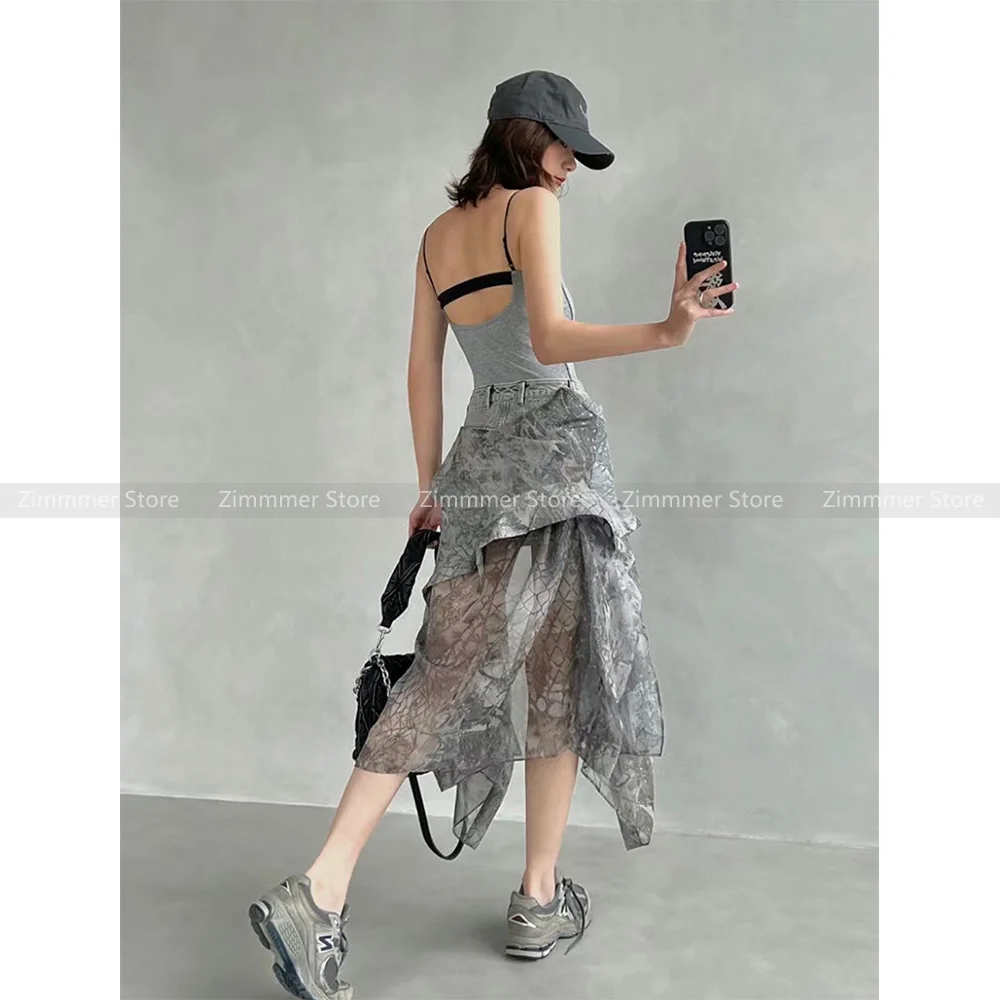 

American retro Spice Girl style printing splicing irregular denim half-body skirt female 2024 spring and summer new