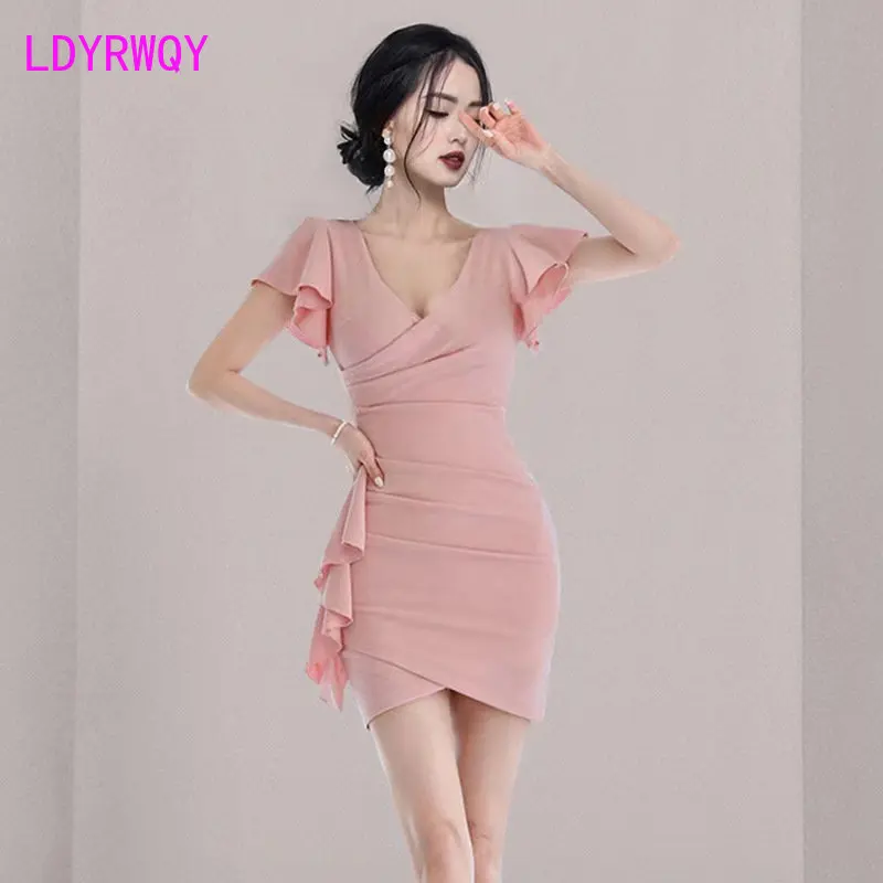 

Lotus leaf dress 2023 Summer V-neck short person is irregular and slim.