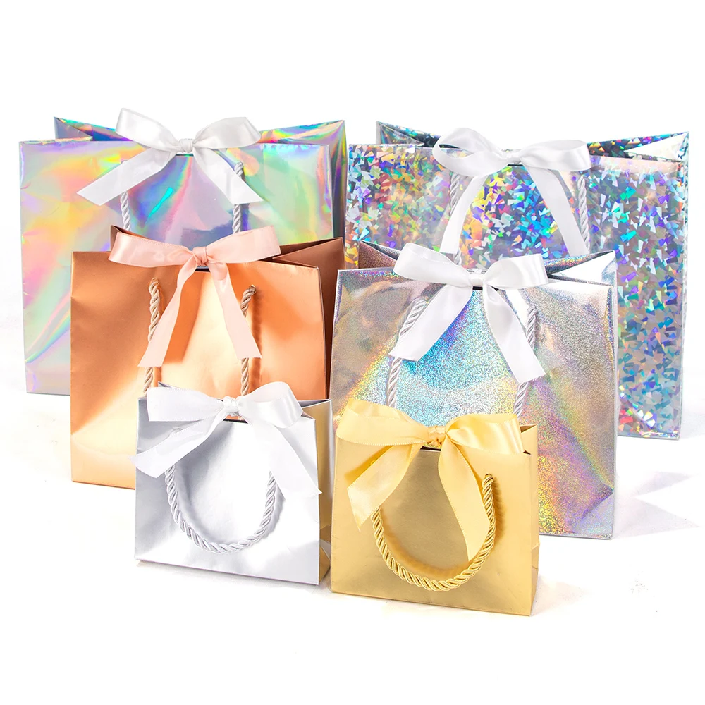 Laser gift paper bag holiday party gold and silver packaging carton ribbon small paper bag