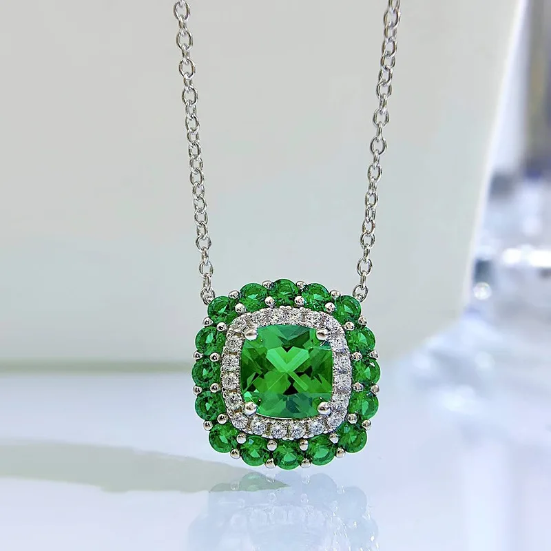 

Женский кулон из серебра 100% пробы, с изумрудом