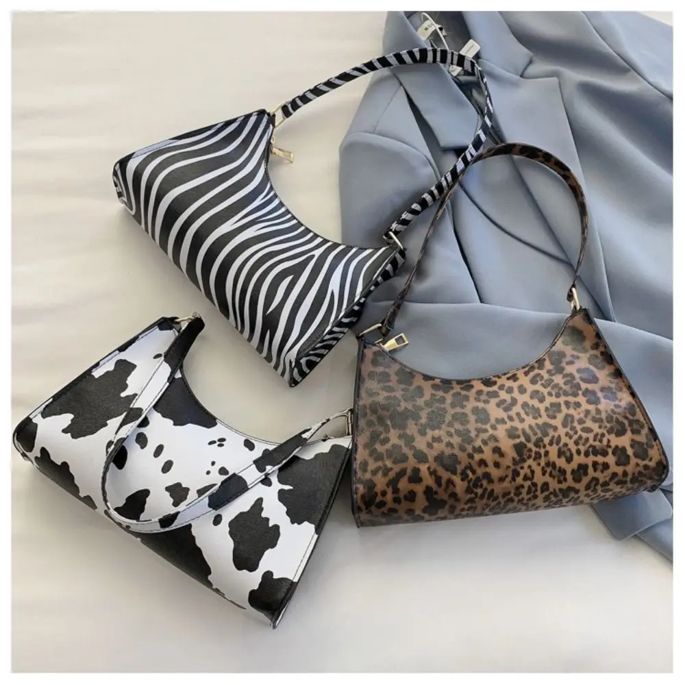 

Сумка на плечо с леопардовым принтом зебры и коровьей кожей
