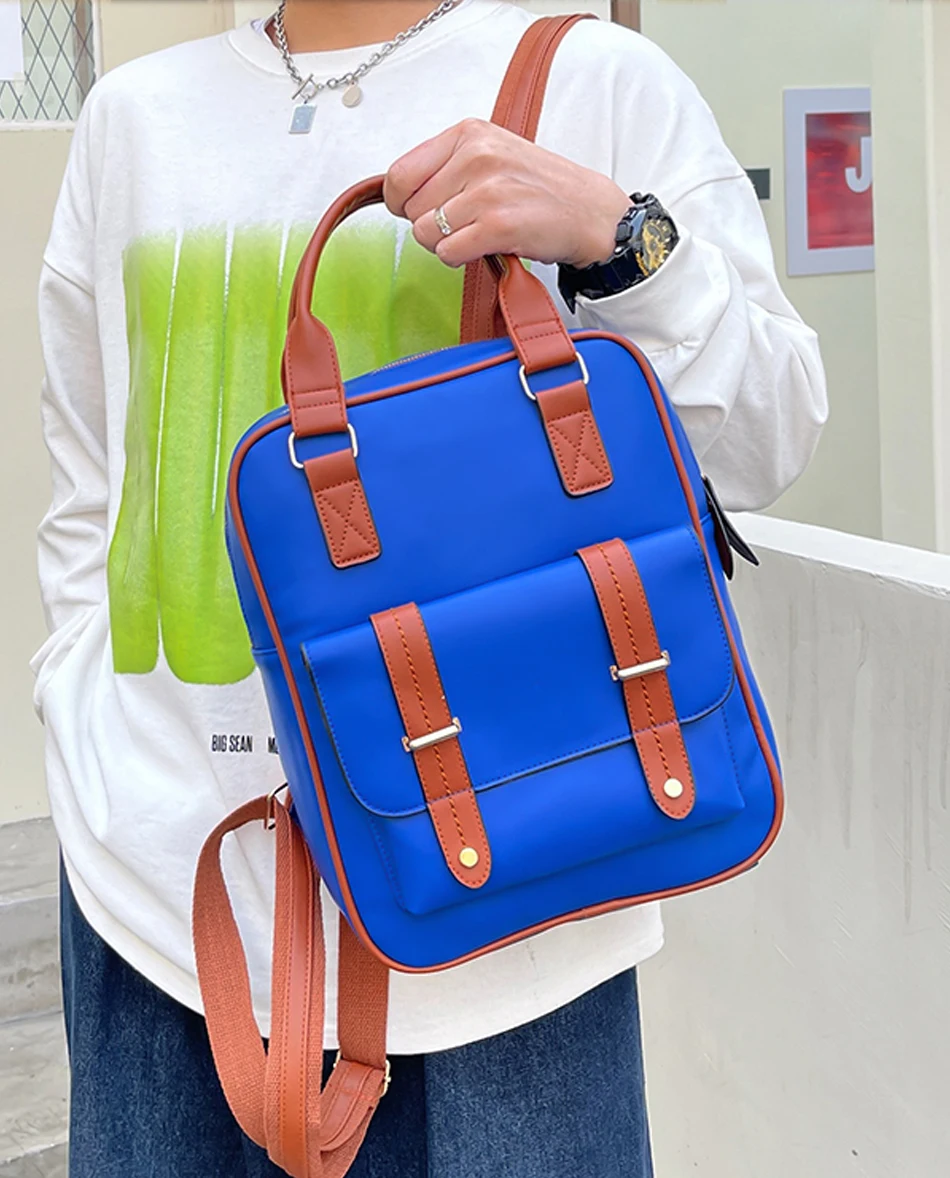 2022 Large Capacity Solid Color Backpack High Quality Leather Shoulder Bag Women Famous Designer Bags New Plush Pendant Backpack