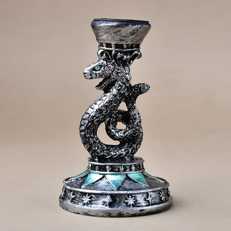 

Cross-border resin green eye silver snake ornament home decoration handicraft crystal ball base rough ore display bracket