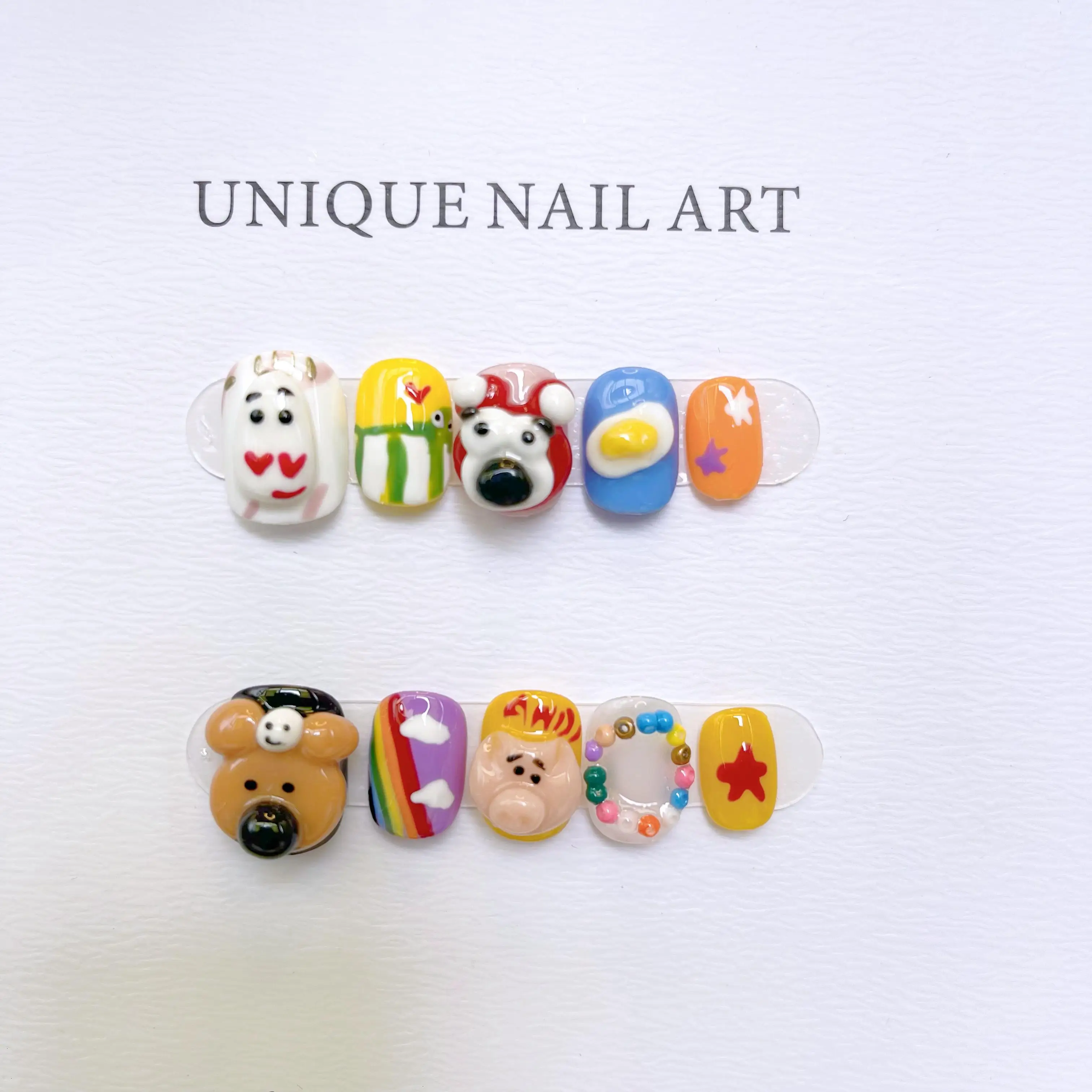 

Wholesale Delightful Hand-Sculpted Cartoon Cute Detachable Reusable High-Quality Whitening Handcrafted Press On Nails.No.D152