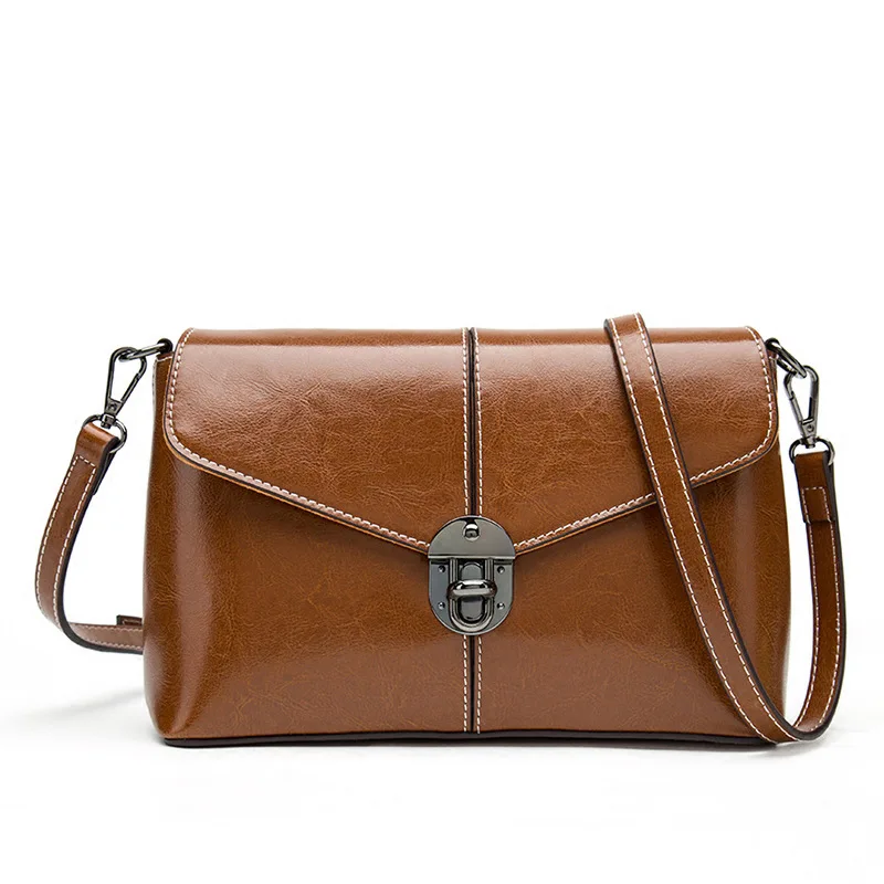 

2024 Korean version of the new retro cowhide women's bag trendy women's lock single shoulder small square bag leather