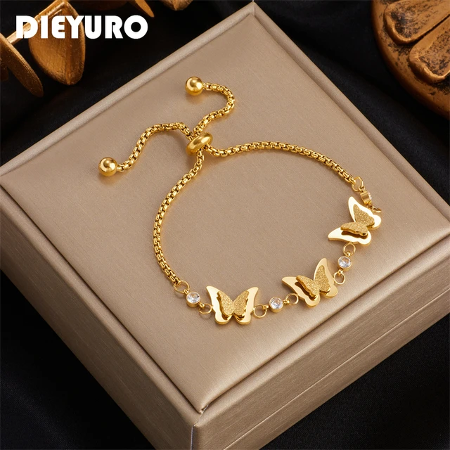 WOMAN'S GOLDEN STEEL BRACELET WITH HEART, BUTTERFLY AND QUADRIFOGLIO