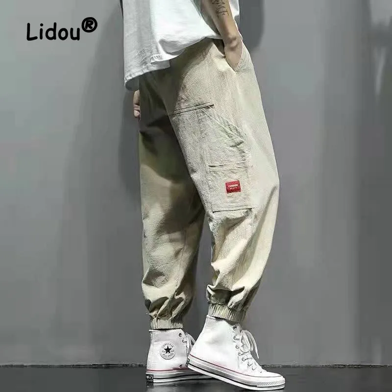 

Spring Summer Fashion Personality Multiple Pockets Men's Cargo Pants Classic Loose Harlan Tie One's Feet Male Patch Rousers