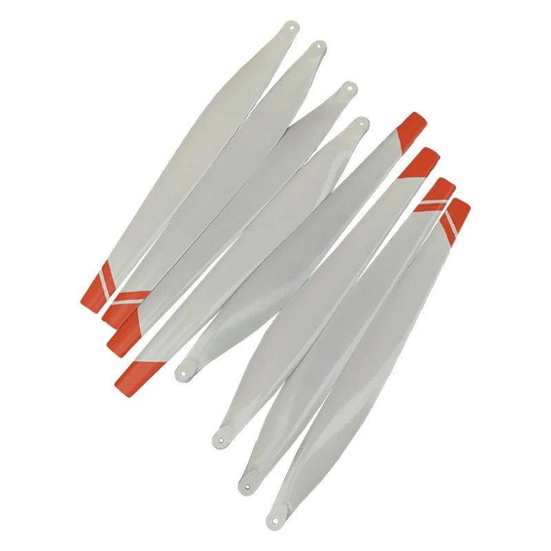 Hélices pliantes R5413+R5415 pour DJI T50 T40, installées sur un drone agricole en action dans un champ.