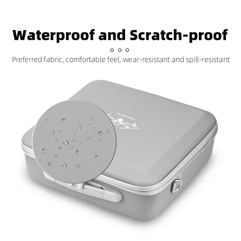 Sac de transport rigide gris clair pour drone DJI, ouvert avec le drone et la télécommande RC-N2/RC2 installés, soulignant la protection anti-choc et imperméable.